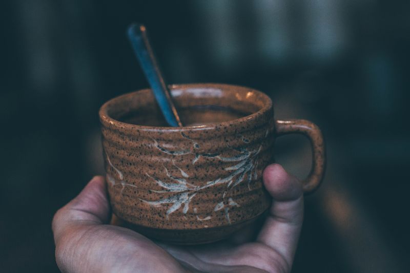 Rich hot espresso coffee served in ceramic cup